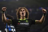 LEICESTER, ENGLAND - JANUARY 14:  David Luiz of Chelsea celebrates after teammate Marcos Alonso of Chelsea scores their team's second goal during the Premier League match between Leicester City and Chelsea at The King Power Stadium on January 14, 2017 in Leicester, England.  (Photo by Laurence Griffiths/Getty Images)